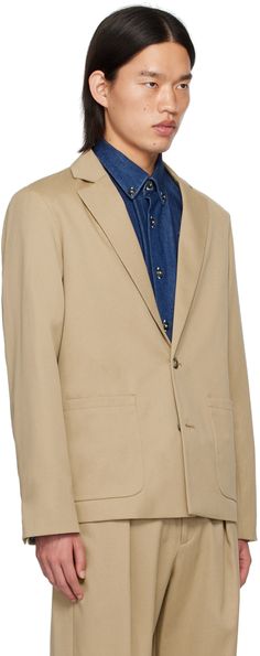 Virgin wool- and cotton-blend twill blazer. · Notched lapel · Two-button closure · Patch pockets · Single-button cuffs · Welt pocket at interior · Viscose twill lining · Faux-horn hardware Supplier color: Beige Tailored Blazer With Button Cuffs For Business Casual, Business Casual Blazer With Notch Lapel And Button Cuffs, Lapel Collar Gabardine Blazer With Pockets, Gabardine Blazer With Lapel Collar And Pockets, Classic Cotton Blazer With Button Cuffs, Classic Semi-formal Cotton Outerwear, Beige Blazer With Notch Lapel And Button Cuffs, Tailored Gabardine Blazer For Formal Occasions, Modern Single Breasted Wool Blazer