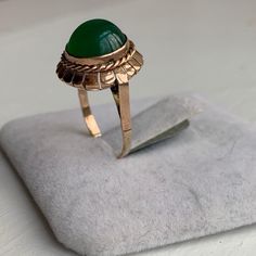 Adorable vintage Green Chalcedony stone attached to 18 Kt rose gold band. Stone size is 11mm round and has a vivid adularescence. This ring is a must have for any wine night. Stone is clean and doesn't have visible inclusions  Size 5 it can be size  Circa 1950 It's a beautiful piece of jewelry for you to enjoy and to be  pass to generations to come.  check ou more info @ninariojewelry In/teresa-pecego-586752190 Each piece has been identified and carefully graded by Maria Pecego who is certified Antique 14k Stamped Round Emerald Ring, Vintage Round Emerald Ring For Formal Occasions, Formal Rose Gold Round Dome Ring, Elegant Domed Emerald Ring Gift, Elegant Green Domed Rings, Vintage 14k Rose Gold Oval Jewelry, Vintage 14k Rose Gold Rings For Formal Occasions, Vintage Green Solitaire Ring, Green Dome Ring For Formal Occasions