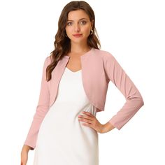 A good shrug is essential to every woman's wardrobe. Warm enough to wear on its own to keep your arms and upper back covered. The long-sleeve shrugs are also great if you have a sleeveless dress or a cute sleeveless shirt. It's darted at the bust to create a shapely figure, while the curved front at the back creates an elegant and stylish silhouette. Dress Shrug, Long Sleeve Shrug, Cropped Shrug, Shrug For Dresses, Bolero Shrug, Shrug Cardigan, Casual Night Out, Women's Wardrobe, Cropped Cardigan