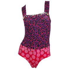 Sexy new YVES SAINT LAURENT purple and red leopard print and polka dot one piece swimsuit or bodysuit! Features a leopard print on the bodice and abstract polka dots on the bottom. Two gold buttons at each strap. Great for the beach, pool, yacht. Also great as a bodysuit with jeans, shorts or a skirt. Marked Size 36 ( Small / Medium) Measurements: tons of stretch 30-38 inch bust 25-30 inch waist Fitted Leopard Print Swimwear For Party, Leopard Print Sleeveless Swimwear For Party, Fitted Leopard Print Bodysuit For Swimming, Bodysuit With Jeans, Red One Piece Swimsuit, Polka Dot One Piece, Red Leopard Print, Purple One Piece, Plunge Swimsuit