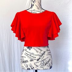 Reposhing This Item I Purchased From @Pamelablue2. Brand New No Tags. Never Worn. Bright And Vibrant Color Orange/Red Cute Flutter Sleeves &Back-Zip Closure Size Small Measurements:: :: Bust(Pit-To-Pit) ~ 14” Total Length ~ 14” :: 95% Polyester - 5% Spandex . Fitted Flutter Sleeve Top For Parties, Fitted Summer Tops With Ruffle Sleeves, Fitted Ruffle Sleeve Summer Tops, Summer Stretch Tops With Butterfly Sleeves, Stretch Summer Tops With Butterfly Sleeves, Summer Tops With Butterfly Sleeves And Stretch, Fitted Tops With Butterfly Sleeves For Day Out, Fitted Top With Ruffle Sleeves For The Beach, Summer Party Tops With Flutter Sleeves