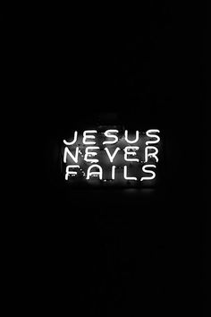 a neon sign that says jesus never falls in the dark with white letters on it