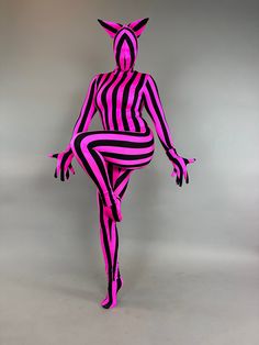 This Stripe Jumpsuit cat costume is the purrr-fect exotic dance wear for when you want to be the life of the festival fashion-ista. Whether taking the stage or making a statement in the crowd, this elegant and mesmerizing creature costume will leave your audience spellbound! Stripe Kitty Cat.Fantasy creature for woman , or man,zentai fashion, exotic dance wear, contortionist costume What included ?HeadpieceCatsuitGlovesSocks High quality ,4 ways stretch Lycra fabric,zipper on the back. Foam ears Fitted Rave Costumes For Festivals, Fitted Rave Costumes For Carnival, Black Stretch Rave Unitard, Fitted Rave Bodysuit For Costume Party, Fitted Pink Costume For Halloween, Fitted Rave Unitard For Cosplay, Fitted Halloween Festival Bodysuit, Fitted Bodysuit For Halloween Festival, Pink Stretch Leotard For Dance