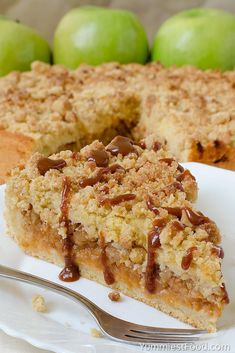 a slice of apple crumb cake on a plate