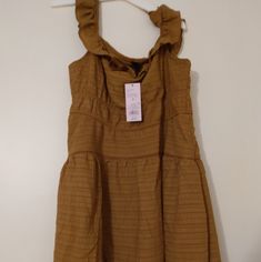 Adorable Brown Sundress Or Even Cover Up For Pool And Beach Days. Sleeveless Brown Mini Dress For Brunch, Sleeveless Brown Sundress With Ruffles, Brown Sleeveless Sundress With Ruffles, Brown Sleeveless Ruffle Sundress, Chic Brown Sundress For Spring, Chic Brown Sundress For Brunch, Brown Sundress, Pool And Beach, Dresses Ladies