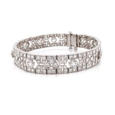 This is a beautiful retro inspired diamond link platinum bracelet. Covered by splendid round cut white natural diamonds 10.21 ct in total. Diamonds are all natural in G-H Color Clarity VS. Platinum 950 metal. Length: 17.4 cm Width. 1 cm Weight: 31 g Exquisite Platinum Diamond Bracelet With Brilliant Cut, Exquisite Platinum Tennis Bracelet With Diamond Accents, Exquisite Platinum Tennis Bracelet For Wedding, White Gold Platinum Diamond Bracelet For Wedding, Exquisite Platinum Diamond Bracelet With Single Cut Diamonds, Exquisite Platinum Diamond Cut Bracelet, Exquisite Diamond Cut Platinum Bracelet, Platinum Tennis Bracelet With Diamond Accents For Wedding, Wedding Platinum Diamond Bracelet In Diamond White