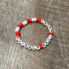 Jingle Bell Rock Christmas Friendship Bracelet.  Letter shape may vary due to availability. Slight variations in bead shape and shade may occur. Custom bracelet available. Custom Bracelet, Bead Ideas, Bracelet Ideas, Jingle Bell, Christian Jewelry, Craft Business, Custom Bracelets