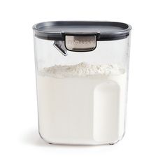 a glass container filled with white flour