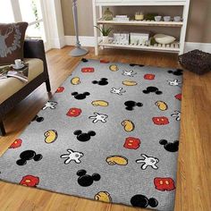 a mickey mouse rug in a living room