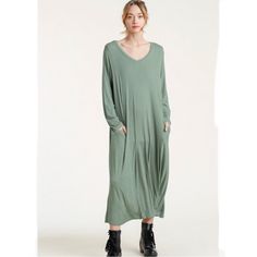 This V-Neck, Long Sleeve, Ribbed Maxi Dress Has Pockets And Panache. A Fabulously Comfortable Dress In A Beautiful Sage Color That Can Be Worn Alone For Lounging Or Casual Errands, Or Layered And Dressed Up For Work Or For Brunch. 92% Rayon. 8% Spandex. Casual Green V-neck Dress For Fall, Flowy V-neck Midi Dress For Loungewear, Relaxed Fit V-neck Midi Dress, Casual Solid V-neck Midi Dress, Fall V-neck Solid Color Maxi Dress, Relaxed Fit V-neck Maxi Dress, Casual Long Sleeve V-neck Dress For Spring, Casual V-neck Maxi Dress For Fall, Spring Long Sleeve Green V-neck Dress