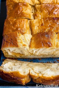 a loaf of bread sitting on top of a blue tray