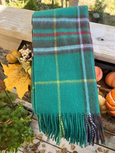 Wear your favourite tartan design all year round! Measures approximately 12″ wide, scarf length at least 56″ long with a 3″ fringe on either end. Lambswool is considered the highest quality of sheep's wool on the market. Taken from a sheep at its first shearing, lambswool is incredibly soft, smooth, resilient and has superior elasticity. The unique weaving process generates air pockets that retain heat while preventing moisture. Along with being natural, breathable and hypoallergenic, our lambswool can be worn comfortably against the skin Wool Handwoven Winter Scarves, Knit Tartan Scarf, Tweed Tarten Scarf, Scottish Plaid Winter Scarf, Luxury Plaid Wool Scarves, Cashmere Tartan Scarf, Tartan Design, Weaving Process, Newfoundland