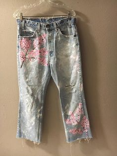 Cherry blossom hand painted jeans custom order | Etsy Spring Hippie Wide Leg Jeans, Spring Hippie Wide-leg Jeans, Hippie Wide Leg Jeans For Spring, Wide Leg Hippie Jeans For Spring, Relaxed Fit Jeans For Spring Festival, Spring Festival Denim Jeans, Spring Floral Print Relaxed Fit Jeans, Handmade Cotton Bottoms For Spring, Bohemian Relaxed Fit Jeans For Spring