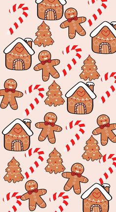 gingerbreads and candy canes are arranged on a pink background with red and white stripes