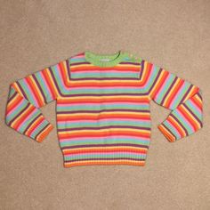 Colorful Striped Knit Long Sleeve Sweater. On Left Shoulder Are 3 Flower Buttons. Comes With Extra Button- New With Tags! Very Pretty And Bright Sweater Perfect For Spring! Look At The Rest Of My Closet For Talbots Bottoms To Pair It With! Size 10 Is New Without Tags! Playful Knitted Tops For Spring, Casual Knit Tops For Playtime, Playful Sweater For Spring Playtime, Casual Spring Sweater For Playtime, Playful Knitted Cotton Tops, Colorful Playful Long Sleeve Tops, Pink Sweater For Spring Playtime, Playful Winter Sweater For Playwear, Playful Spring Sweater For Playtime