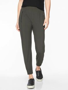 Athleta Cosmic Jogger Arbor olive (FIRST PICTURE) SIZE S #351046 EXCELLENT USED CONDITION $98.00   FIT & SIZING Semi-fitted, Mid rise Skims easily over the body for a just-right fit, Sits below the natural waist Inseam: Regular: 26" Petite: 24" Tall: 29"   PRODUCT DETAILS FOR: Commuting, working and traveling FEEL: Lightweight fabric is soft and sleek with surprising stretch FAVE: The sleek detailing at the waist creates a cinched effect without the bulk 2 POCKETS: secure front zip #351046   FAB Jogger Outfit, Best Joggers, Travel Pants, Womens Pants, Confident Woman, Fashion Joggers, Performance Outfit, Arbor, Workout Pants