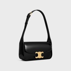 SHOULDER BAG TERENCE IN PATENT CALFSKIN - BLACK | CELINE Luxury Baguette Bag For Travel, Luxury Travel Baguette Bag, High-end Formal Baguette Bag, Luxury Handheld Baguette Bag, Formal Rectangular Baguette Bag With Branded Hardware, Rectangular Baguette Bag With Palladium Hardware For Travel, High-end Baguette Bag With Gold-tone Hardware For Formal Events, Luxury Baguette Bag With Palladium Hardware, Luxury Rectangular Baguette Bag With Palladium Hardware