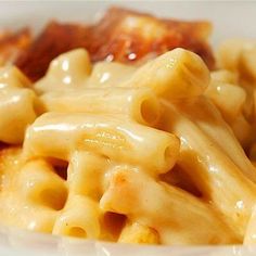 a plate with some pasta and meat on it