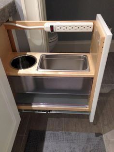 the kitchen sink is built into the cabinet