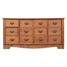 an old wooden dresser with many drawers on the top and bottom drawer, against a white background