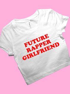 Future Rapper Girlfriend SNUG FIT Crop Top | Cute Crop Top | Graphic Top | Gift For Her | Y2K Baby Tee | Y2K crop top | Gift for friend Comfy Top to Lounge in! Actual item may be lighter/darker than pictured. M A T E R I A L S - SNUG FIT - 100% RING SPUN COTTON - Shoulder Taping S I Z I N G - Size chart is available on our listing photos. S H I P P I N G  &  P R O D U C T I O N  T I M E - Production Time is 2-3 Business Days. (May be delayed during the Holiday Season) - Shipping Time is 2-5 Busi Future Rapper, Y2k Crop Top, Cute Crop Top, Baby Tees Y2k, Y2k Baby Tee, Y2k Clothing, Workout Crop Top, Cute Crop Tops, Cropped Tops