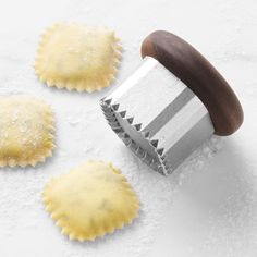 Making homemade ravioli has never been easier. Designed with form and function in mind, our walnut-handled stamp helps you perfectly cut and seal pasta dough into uniform squares. The durable stainless-steel tool also makes a great gift. Crafted of durable stainless steel. Handle is made of walnut. Designed and developed by Williams Sonoma. Pasta Making Tools, Wood Kitchen Tool, Homemade Ravioli, Apple Peeler, Pasta Making, Baking Basics, Kids Pottery, Pasta Dough, Fall Cocktails