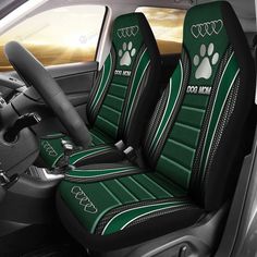 the interior of a car with green and black seats