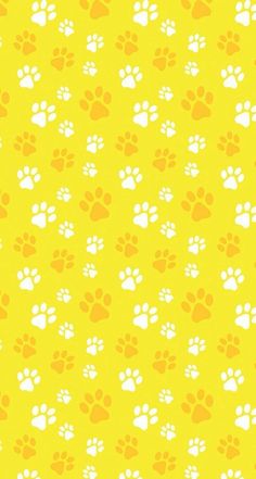 an orange and white dog paw print pattern on a yellow background, with small white paws