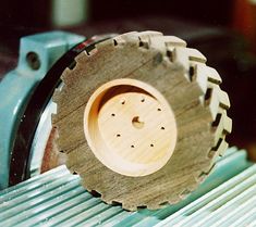 a wooden object sitting on top of a table