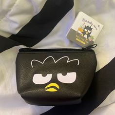 Brand New Badtz-Maru Mini Pouch/ Coin Purse Black Casual Coin Purse For Daily Use, Casual Black Coin Purse For Daily Use, Trendy Black Coin Purse For Everyday, Cute Black Coin Purse As Gift, Cute Black Wallet As Gift, Casual Coin Purse With Removable Pouch, Black Pouch With Zipper Closure As Gift, Gift Black Pouch With Zipper Closure, Trendy Black Pouch Coin Purse