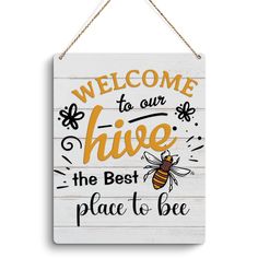 a sign that says welcome to our hive the best place to bee