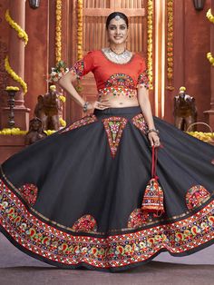 Black Art Silk Gamthi Work Designer Lehenga features a art silk blouse with art silk lehenga and dupatta. Embroidery have gamthi work with real mirror work and patch work. This Style is made in India and checked by hand to ensure high quality. Wash Care : Dry Clean Note: 1. Return Policy: As all the products in Myracouture brand are made-to-order, returns and refunds are not accepted. 2. Delivery Time: These are customised products which will take upto 10days to dispatch from our Warehouse, so t Gamthi Work, Ghaghra Choli, Lehenga Red, Black Lehenga, Lehenga Blouse Designs, Party Wear Gown