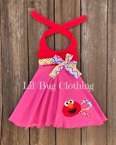 Elmo Sesame Street Birthday Girl Dress | Lil' Bug Clothing Playful Pink Twirl Dress For Playdate, Pink Fun Twirl Dress For Spring, Fun Summer Twirl Dress For Playdate, Fun Pink Twirl Dress For Spring, Pink Twirl Dress For Spring, Playful Pink Stretch Dresses, Whimsical Pink Twirl Dress For Playtime, Pink Summer Party Twirl Dress, Pink Twirl Dress For Summer Party