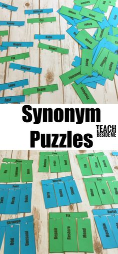 a wooden table topped with blue and green pieces of paper that say syonomy puzzles