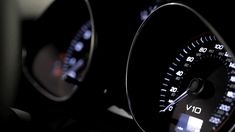 the speedometers and dash lights of a car