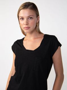 Details The Traveler Twist Tee is sure to be your new wardrobe staple. This ultra-soft cotton slub knit t-shirt has a classic scoop neck, short sleeves, and a loosely fitted bodice. A twisted neck detail brings the final touch to this sustainably made lightweight tee. We won’t blame you if you rock this essential not-so-basic every single day. Pull On Top Front Chest Pocket Scoop Neck with Twisted Detail Lightweight Relaxed Fit Sustainable Available in 1X-3X Size + Fit Model is 5'9 wearing size Black Scoop Neck T-shirt For Everyday, Black Scoop Neck T-shirt, Casual Black Short Sleeve Top With Scoop Neck, Casual Black Scoop Neck Short Sleeve Top, Black Relaxed Fit Short Sleeve Top For Everyday, Travel Tees, Final Touch, You Rock, Every Single Day