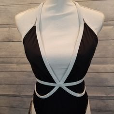 Black Swimsuit Trimmed In White. Deep V/Plunge In The Front. New Without Tag. D-0071 Fitted Triangle Top Bodysuit For Night Out, Chic Fitted Triangle Top Bodysuit, Spring Party Bodysuit With Triangle Top, Triangle Top Bodysuit For Night Out, Chic Fitted One-piece Halter Top, Chic Triangle Top Bodysuit For Night Out, Chic Bodysuit With Triangle Top For Night Out, Vintage Style Swimwear, Green Bathing Suits