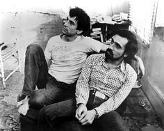 two men sitting next to each other on the floor in front of a mirror with text that reads robert de niro and martin scorse on the set of taxi driver