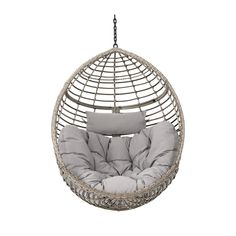 a hanging egg chair with pillows on the bottom and back, in grey color scheme