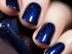 You've found the one. Looking Up is a captivatingly deep midnight blue nail polish that's sure to remind you of a night sky filled with dazzling stars. Precisely formulated with the perfect balance of over-sized holographic pigments and an assortment of gold flakes for, Looking Up is stunning in any lighting conditions. Don't be surprised if you find yourself reaching for this bottle again and again! Fully opaque in 2-3 coats Please be advised that this listing is for 1 (one) bottle of Looking U Ilnp Nail Polish, Holographic Nail Polish, Blue Nail Polish, Blue Nail, Popular Nails, Holographic Nails, Nail Polishes, Nail Polish Colors, Nail Lacquer