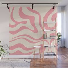 a pink and white wall mural in an office