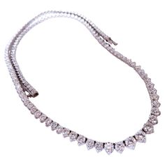 13.20ct Natural Diamonds Necklace  classic riviera 0.50ct in center g-h color vs-2 clarity 14kt white gold 22.7 grams 18 inches long Properly Calibrated. $40,000.00 appraisal to accompany Ruby Diamond Necklace, Open Heart Necklace, Diamonds Necklace, Heart Necklace Diamond, White Gold Necklaces, Cluster Pendant, Tennis Necklace, Modern Necklaces, Brown Diamond