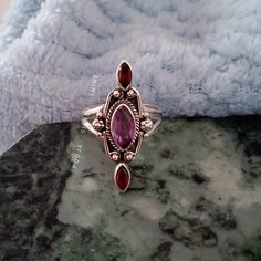 HELLO BUYERS  WELCOME MY SHOP ! ✦ Visit our Etsy shop : https://www.etsy.com/in-en/shop/poojasilvershine?ref=seller-platform-mcnav and check out all our styles in Jewelry :) Amethyst and Garnet ring, Boho amethyst ring, Sterling Silver Ring, Bridesmaid Rings, natural gemstone ring, designer ring, Gift for mother 》D E T A I L S《 GEMSTONE DETAILS : ✦ Gemstone: Natural amethyst and garnet  ✦ Gemstone Type: Natural ✦ Gemstone Shape: marquise (leaf) ✦ Gemstone Color: purple and red ✦ Gemstone Type: C Marquise Amethyst Jewelry Gift, Marquise Amethyst Jewelry For Gift, Gift Marquise Amethyst Jewelry, Marquise Gemstone Crystal Ring Gift, Marquise Crystal Ring With Gemstone For Gift, Bohemian Multi-stone Rings For Gifts, Spiritual Ruby Wedding Rings, Purple Ruby Rings As Gifts, Purple Ruby Rings For Gifts