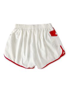 Love the classic white with red piping on these retro 1960's shorts with extra special side pocket with button. Elastic waistband and built in nylon undershorts. We had to hunt for the brand, in tiny stitching the tag says K-Mart, which is AMAZING. Thick quality canvas fee. Fabric: 65% Polyester, 35% Cotton Details: 2 back pockets, 2 side pockets, knee length bermuda, flap tab button front with zip Size: Tag says "Fits 36-38" modern sizing would suggest these fit a size women's medium, or men's White Sporty Athletic Shorts With Side Pockets, Sporty White Athletic Shorts With Side Pockets, White Athletic Shorts With Pockets, White Athletic Shorts With Side Pockets, White Athletic Shorts With Pockets For Summer, Retro White Bottoms With Pockets, White Bottoms With Contrast Trim, Short Length, Sporty White Shorts With Side Pockets, Retro White Short Bottoms