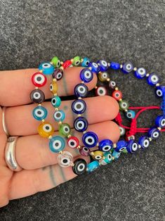 Evil Eye Bracelet Kabbalah Bracelet Wish Bracelet Jewish | Etsy Evil Eye Bead Bracelet Gift, Multicolor Round Evil Eye Jewelry, Multicolor Evil Eye Bracelets As Gift, Multicolor 8mm Beads Evil Eye Bracelet, Multicolor Round Evil Eye Bracelets, Multicolor Evil Eye Bracelet Gift, Multicolor Evil Eye Round Bracelets, Adjustable Multicolor Evil Eye Bracelet With 8mm Beads, Adjustable Round Evil Eye Bracelet