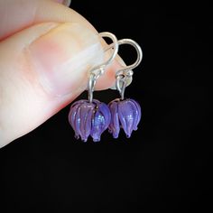 These little blossom earrings are made from lavender-purple glass and are durable and lightweight. These would be a great pair of earrings for someone who needs extremely lightweight earrings or for somebody's first pair of dangling earrings. Celebrate spring! The ear wires are solid sterling silver which is safe for most people with metal allergies. Purple Flower Earrings With Ear Wire For Gift, Purple Flower Earrings With Ear Wire As Gift, Nickel-free Purple Drop Flower Earrings, Purple Nickel-free Drop Flower Earrings, Purple Hypoallergenic Flower Drop Earrings, Purple Hypoallergenic Drop Flower Earrings, Hypoallergenic Purple Flower Drop Earrings, Lavender Dangle Flower Earrings, Purple Flower Drop Earrings