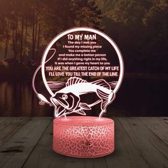 a pink lamp with a fish on it that says, to my man you are the greatest catch of my life