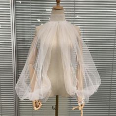 Welcome To My Shop! Wish You Can Get What You Like Here Item: Sleeves Fabric: Tulle Description: It is made of tulle Color: Ivory  Custom Color  Shipping time: It will take 9-14 days. ( Please leave me the date you want the veil ) Note: Our wedding veils are all handmade, so we do not accept refund except for quality issue If it has quliaty issue, please contact me within two days of receiving the veil. We support custom length, so if you want another length of the veil, just tell me. If you hav Fitted Tulle Fabric For Bride, Sheer Tulle Wedding Dress For Bride, Long Sleeve Net Wedding Dress, Fitted Tulle Fabric For Wedding, Fitted Organza Tulle Fabric For Wedding, Sheer Fitted Tulle Wedding Dress, Sheer Tulle Fitted Wedding Dress, Sheer Organza Veil For Party, Tulle Sleeves Diy