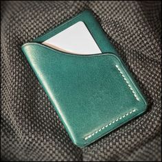 Stylish HANDMADE small English Leather wrap wallet. Dark green colour. 2 pockets. Approx. 10x7cm. This wallet is hand stitched with contrasting White Ritza thread. Will hold 2-3 cards in outer pocket and 3-4 more cards plus paper money in centre pocket. This slim stylish wallet will age well with use. Ideal gift for someone you love. FREE SHIPPING UK. Wrap Wallet, Textile Craft, Minimal Wallet, Simple Wallet, Wallet Design, Small Workshop, Large Leather Tote, Leather Crafts, Handmade Leather Wallet