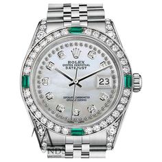 Rolex 31mm Datejust White MOP String Diamond Dial with Diamond & Emerald Bezel & Diamond Lugs SS Watch 68274 Luxury Silver Watch With Diamond Hour Markers, Luxury Designer Diamond Watch With Chronometer, Luxury Green Diamond Watch With Diamond Hour Markers, Luxury Rhinestone Watch With Round Dial, Luxury White Gold Diamond Watch With Jubilee Bracelet, Luxury Silver Watch With Pave Setting, Luxury Chronograph Watch With Diamond Markers, Luxury Formal Watch With Diamond Accents, Luxury Business Chronograph Watch With Diamond Markers